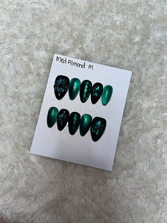 Black and green purpleish cat eye