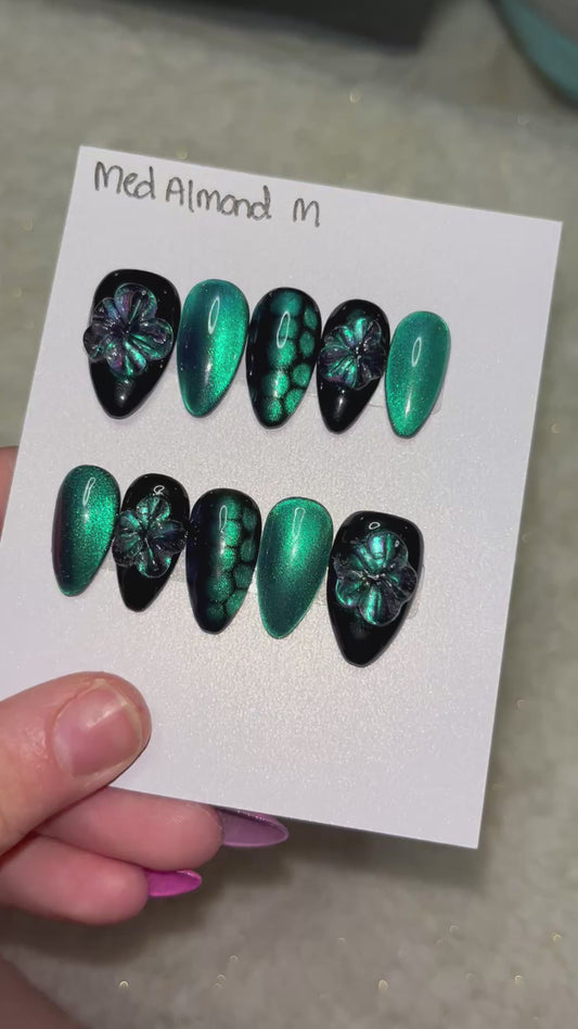 Black and green purpleish cat eye